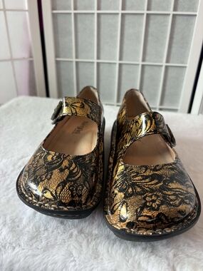 Alegria Metallic Gold and Black Floral Mary Jane Clogs